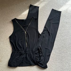 Black Jumpsuit with pockets, stretch material and straight legs Size Small.